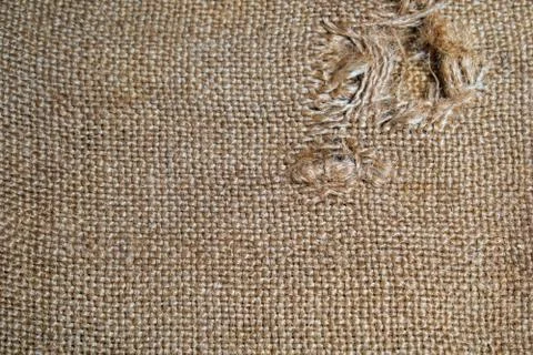 Torn burlap for the background Stock Photos