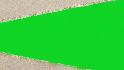 Torn canvas fabric texture material revealing animated on green screen gives Stock Footage 335209791