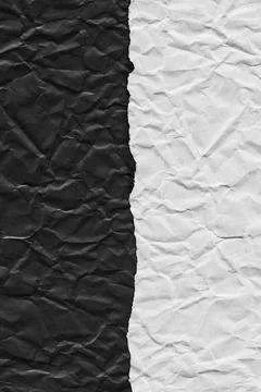 Torn edge of dark and light paper. vertical edge crossing. texture Stock Photos