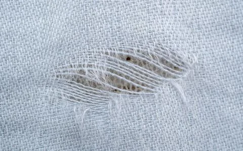 Torn fabric Stock Photos