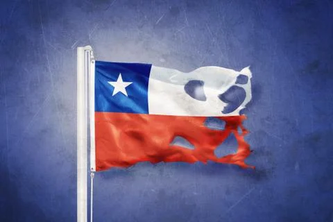 Torn flag of Chile flying against grunge background Stock Illustration
