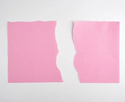 Torn in half empty pink sheet of paper on white background 스톡 사진