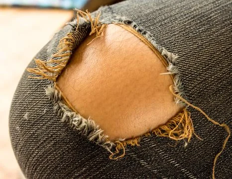 Torn jeans Stock Photos