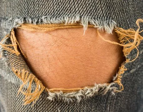 Torn jeans Stock Photos