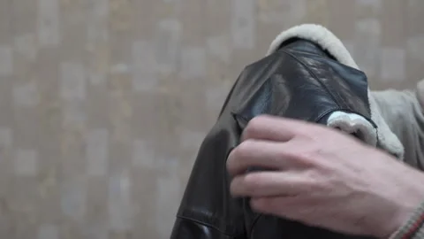 Torn leather jacket Stock Footage 308714020
