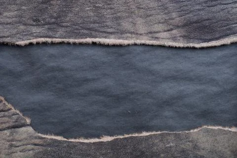 Torn leather Stock-Fotos