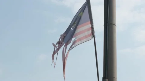 Torn Malaysia Flag Stock Footage 138349994