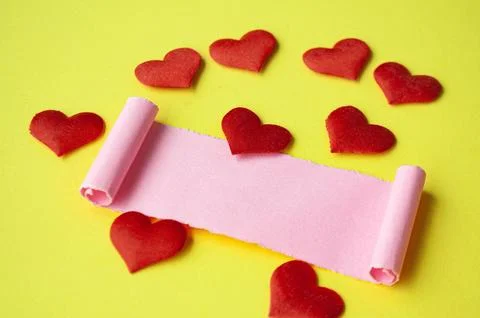 Torn paper with customizable space for text or ideas for Valentine's day. C.. Stock Photos