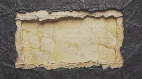 Torn paper on dark background texture. Fotos Stock