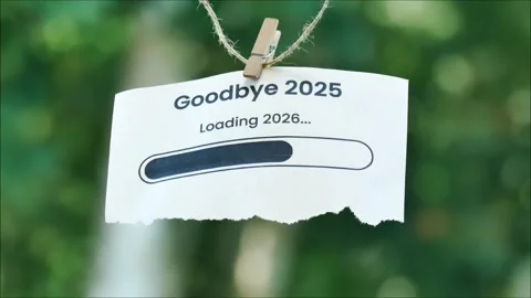 Torn paper hanging on twine reading 'Goodbye 2025 Loading 2026' Stock Footage 320150160
