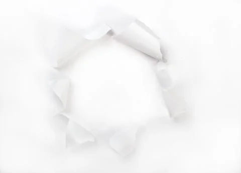 The torn paper with an opening for a text or image insert 스톡 사진