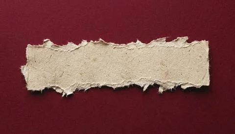 Torn paper on red background texture. Stock Illustration