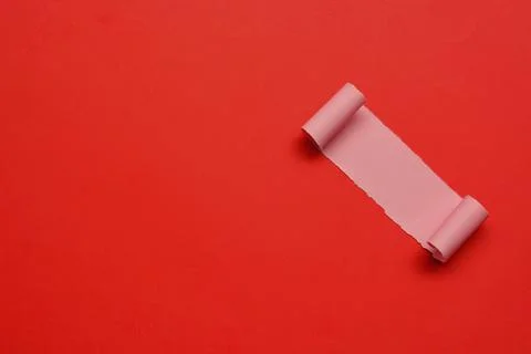 Torn paper with red paper background. Valentine's Day concept Stock Photos