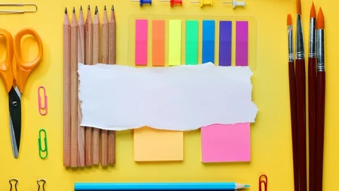 Torn Paper Room For Text. School Stationary Flat Lay Timelapse 4K Stock Footage 93626350