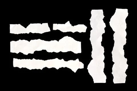 Torn Paper Strips on Black Background Фото
