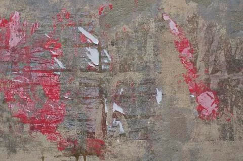 Torn paper on wall Stock Photos