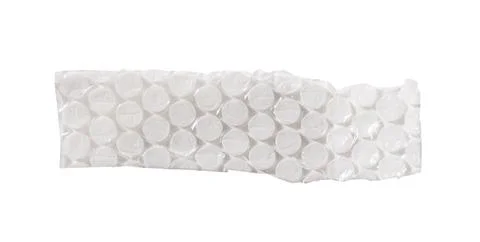 Torn piece of bubble wrap with repeating circular cells and slightly crumpled Stock Photos