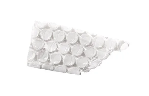 Torn piece of transparent bubble wrap with pressed air cells and glossy plast Stock Photos
