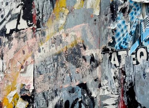 Torn posters and graffiti background texture Stock-Fotos