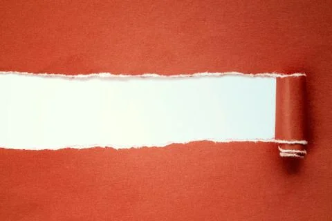 Torn red paper with copy-space. Stock Photos