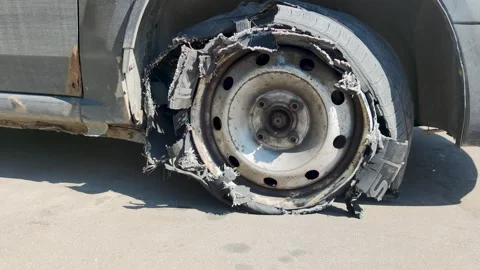 Torn rubber on a car wheel Stock Footage 289666306