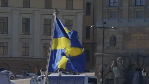 Torn Swedish Flag Stock Footage 94763164