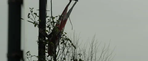 Torn Union Jack Fluttering Gently in the Wind Stock-Footage 140260997