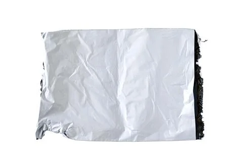 Torn used plastic bag isolated on white, top view, clipping path Foto stock