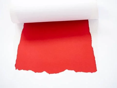 Torn white paper isolated on red Torn white paper isolated on red Copyrigh... Stock Photos