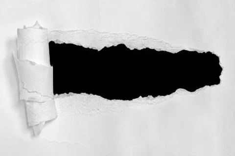 Torn white paper with space for text. Stock Photos