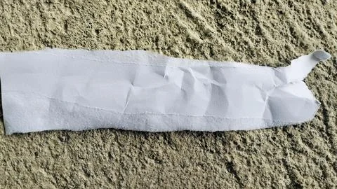 Torn White Paper Strip on Rough Gray Concrete Texture Background Stock Photos