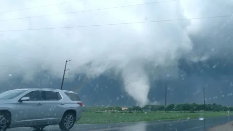 Tornado and Rainbow Storm Chase Dashcam Stock Footage 246144114