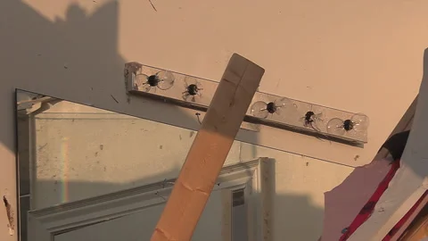 Tornado and severe thunderstorm damage to homes in residential area Stock Footage 157618096