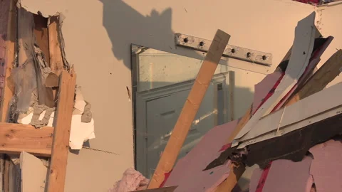 Tornado and severe thunderstorm damage to homes in residential area Stock Footage 157618308