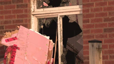 Tornado and severe thunderstorm damage to homes in residential area Stock Footage 157618780