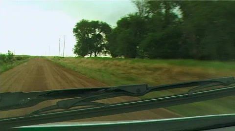 Tornado with debris cloud seen from storm chasers vehicle Stock Footage 458125