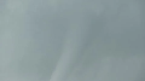 Tornado Funnel. Camera pans down the the tornado to the ground. Stock Footage 11436032