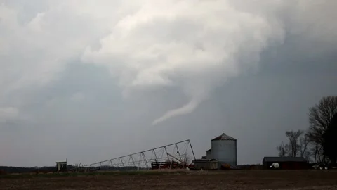Tornado funnel cloud over farm Stock Footage 237669775