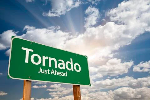 Tornado Green Road Sign with Dramatic Clouds and Sky. Stock Photos
