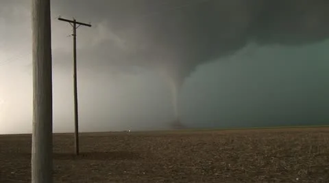 Tornado or twister near South Plains Texas over farmland Stock Footage