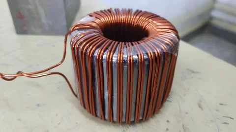 A toroidal inductor before apply the outer coating Fotos de archivo