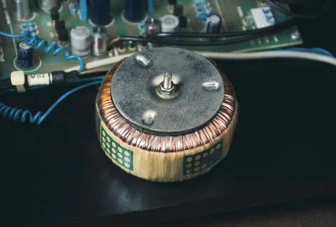Toroidal transformer for step down AC voltage Stock Photos