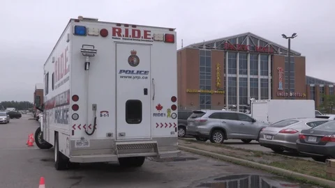Toronto aid workers load plastic water bottles for the homeless during heatwave Stock Footage 91544539