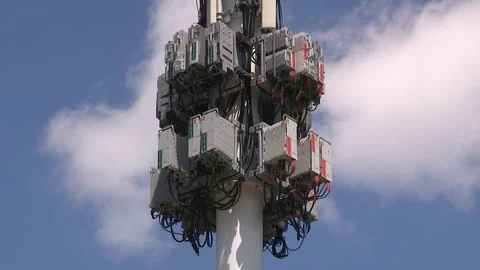 Toronto, On, Aug 1 2026 Cell tower with multiple antennas on it in the city Stock Footage 341027461