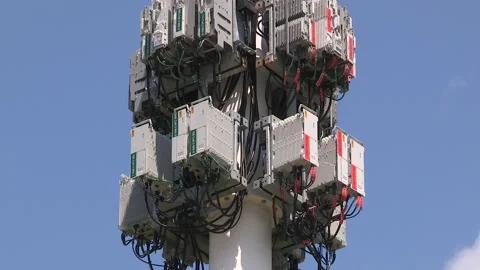 Toronto, On, Aug 1 2026 Cell tower with multiple antennas on it in the city Stock Footage 341027462