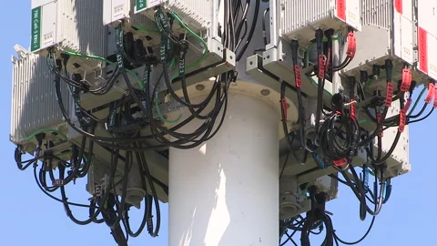 Toronto, On, Aug 1 2026 Cell tower with multiple antennas on it in the city Stock Footage 341027464