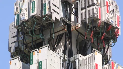 Toronto, On, Aug 1 2026 Cell tower with multiple antennas on it in the city Stock Footage 341027484