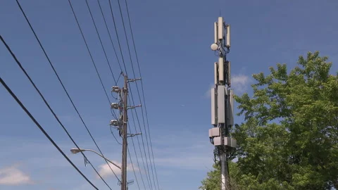 Toronto, On, Aug 1 2026 Cell tower with multiple antennas on it in the city Stock Footage 341027519