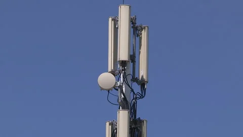 Toronto, On, Aug 1 2026 Cell tower with multiple antennas on it in the city Stock Footage 341027520