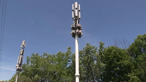 Toronto, On, Aug 1 2026 Cell tower with multiple antennas on it in the city Stock Footage 341027522